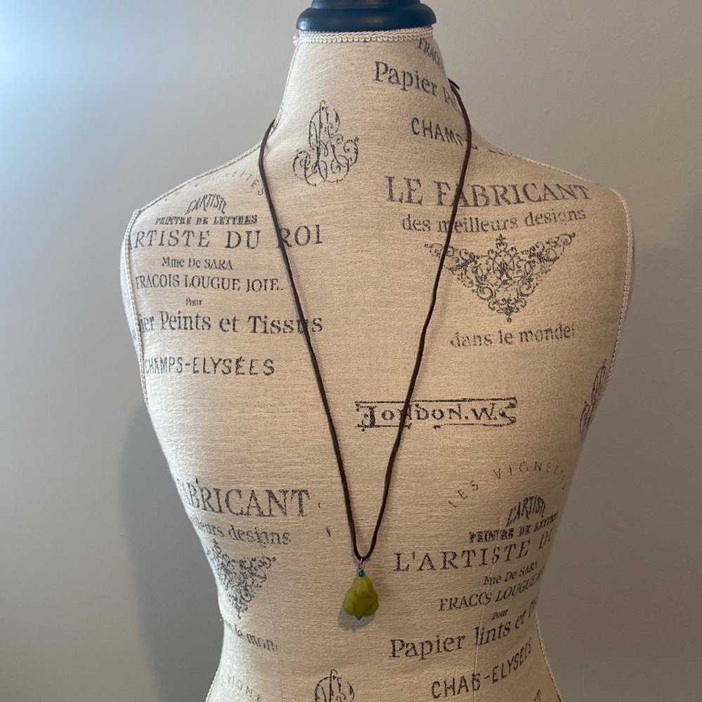 Approximately 17 inch necklace with little Buddha